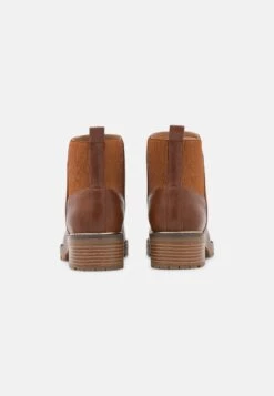 Korte Laarzen - Cognac -Damesmode 406ff82c21844ad9a845e876f56d58ec